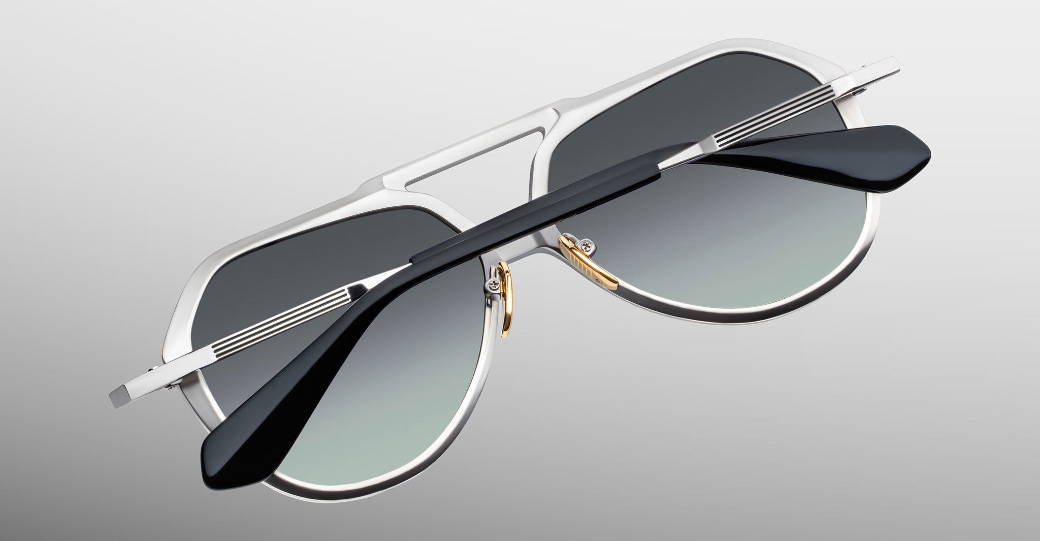 Jacques Marie Mage Maxime aviator sunglasses, silver frames, dark gradient lenses, close-up front view.