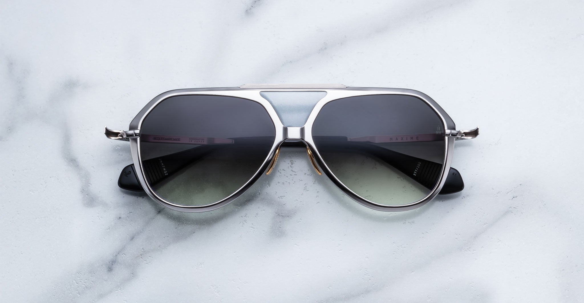 Jacques Marie Mage Maxime silver aviator sunglasses with dark polarized lenses, front view.