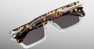 Jacques Marie Mage Melchior sunglasses, front view, feature bold brown tortoiseshell frames with silver accents.
