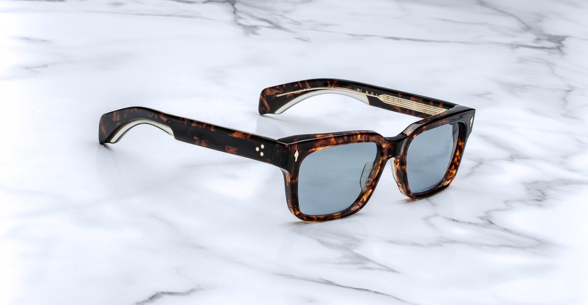 Jacques Marie Mage Molino 55 tortoiseshell sunglasses with blue polarized lenses, top view.