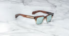 Jacques Marie Mage Molino 55 sunglasses with green polarized lenses, top view.