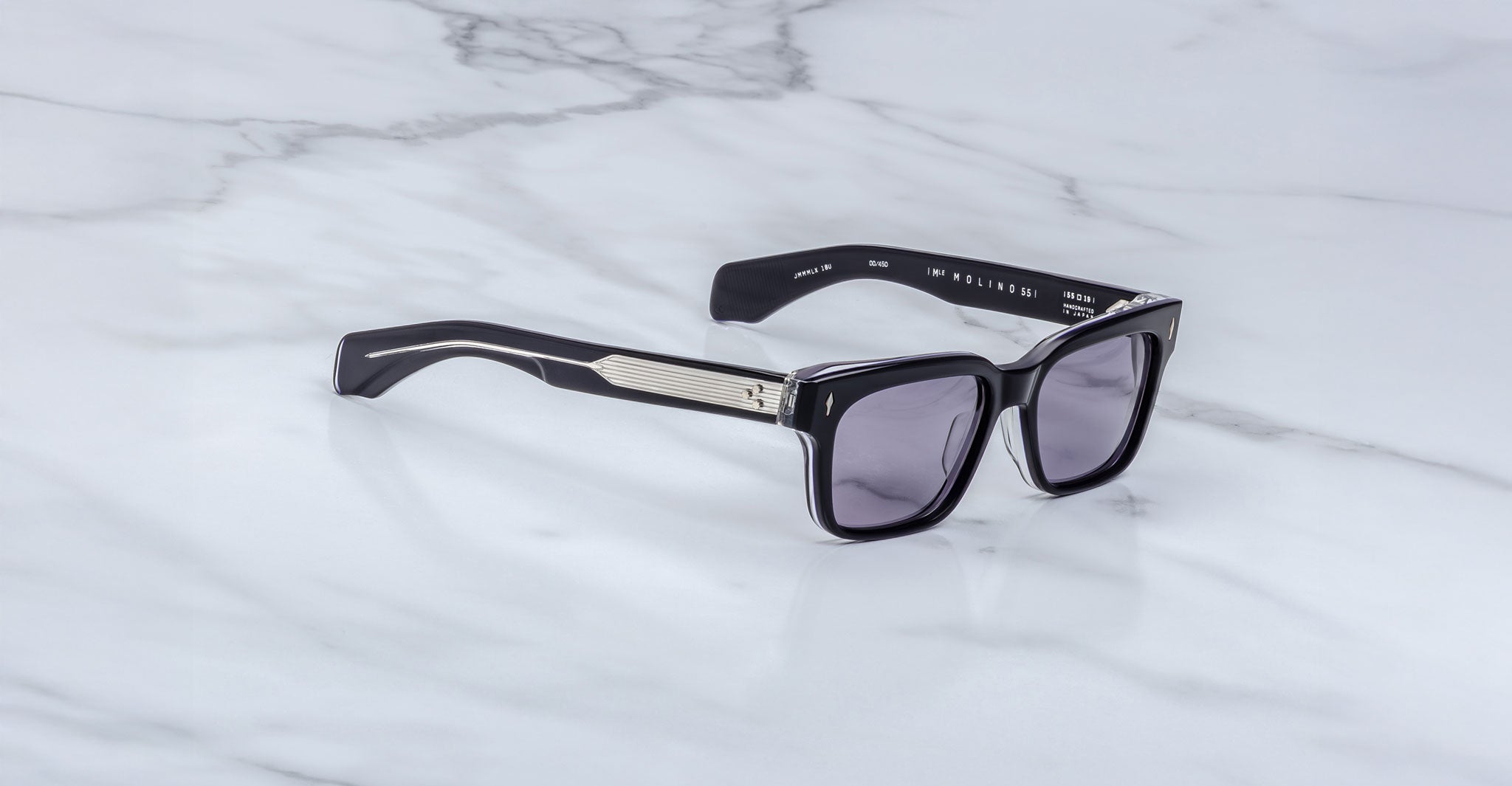 Jacques Marie Mage Molino 55 black rectangular sunglasses with dark lenses and metallic accents, front view.