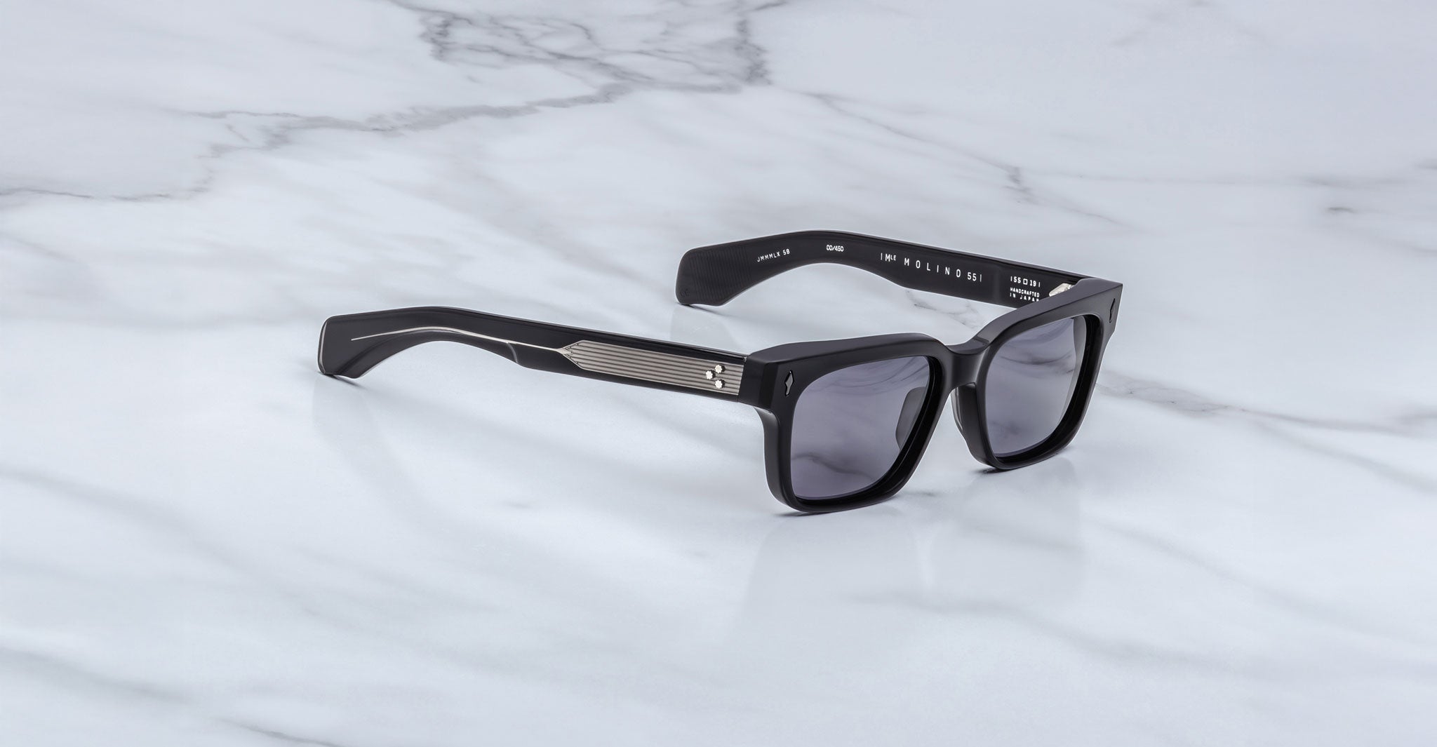 Jacques Marie Mage Molino 55 black rectangular sunglasses with dark lenses and metal temples, front angle view.