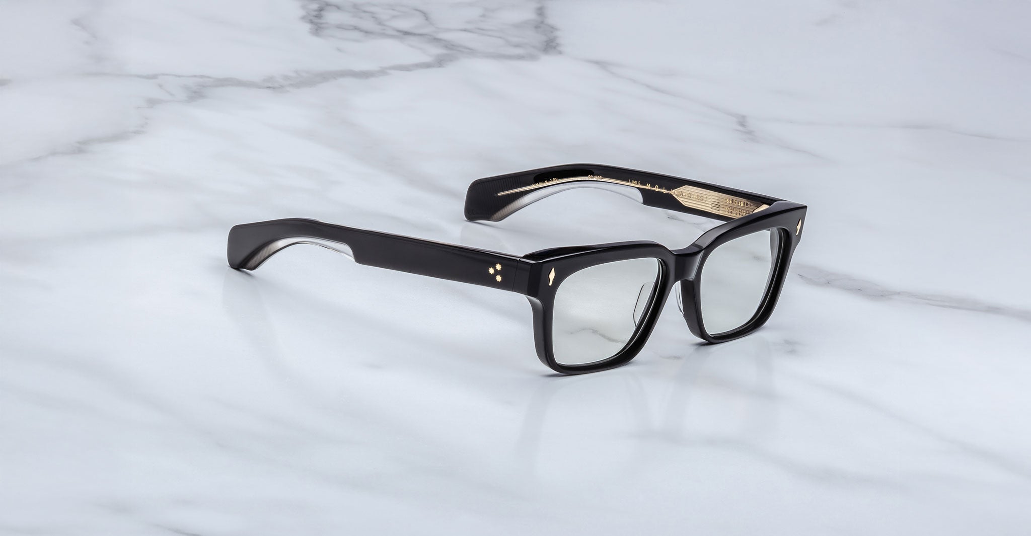 Jacques Marie Mage Molino 55 black rectangular eyeglasses with clear lenses, top view.
