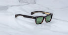Jacques Marie Mage Molino rectangular tortoiseshell sunglasses with green lenses and gold accents, front view.