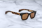 Jacques Marie Mage Molino square sunglasses, brown tortoiseshell frame, UV-protective brown lenses, front angle view.