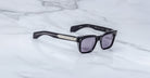 Jacques Marie Mage Molino black square-frame sunglasses with UV lenses, front view.
