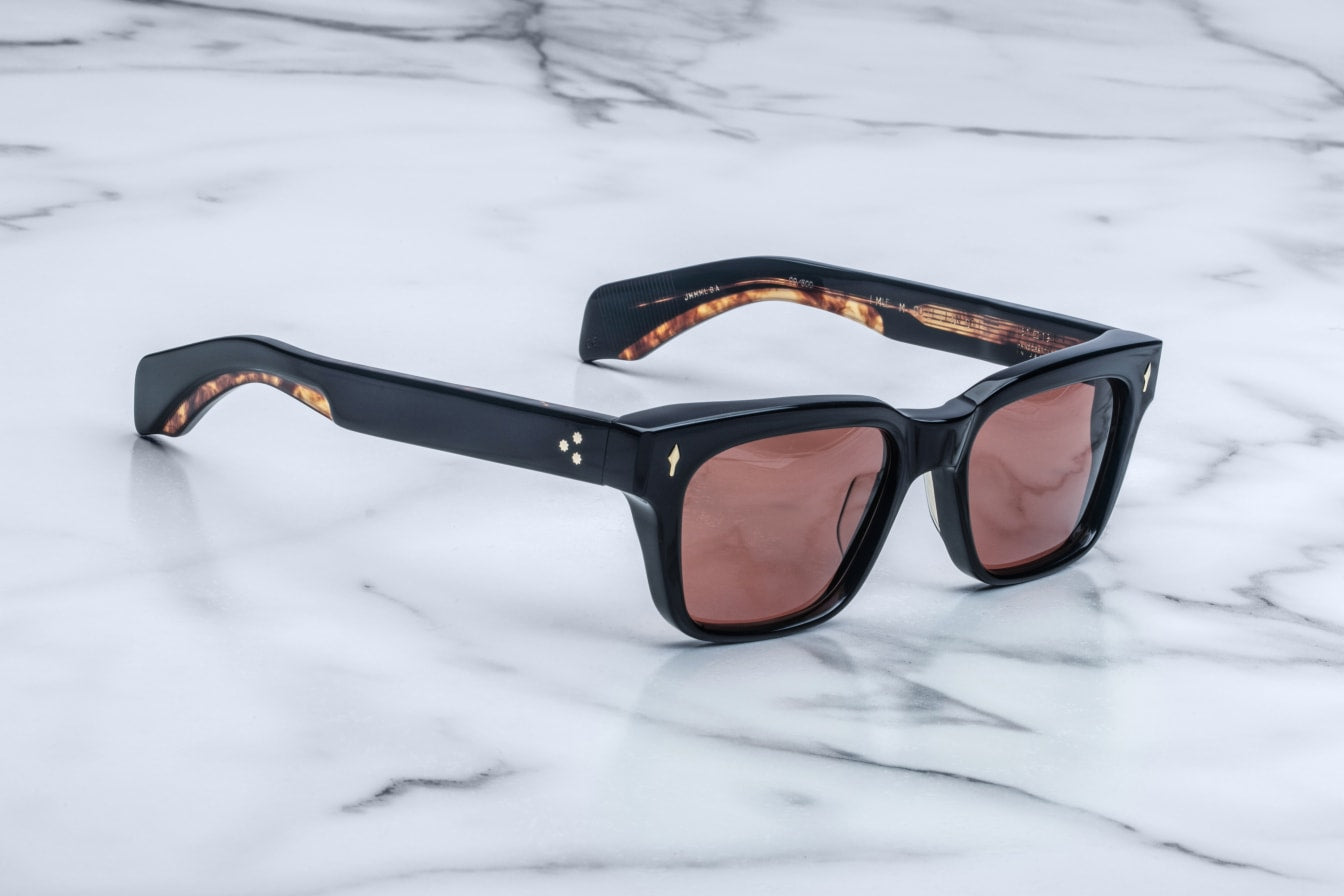 Jacques Marie Mage Molino black rectangular sunglasses with brown lenses and tortoiseshell inner arms, front view.