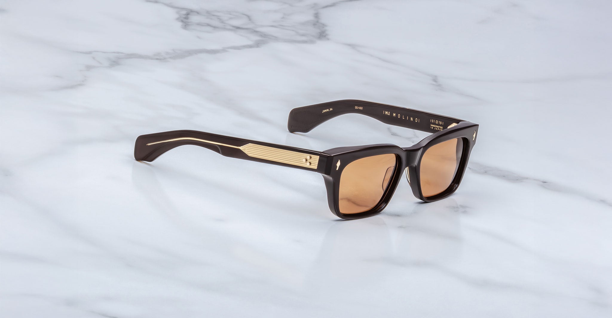 Jacques Marie Mage Molino sunglasses with gold-accented arms, side view.