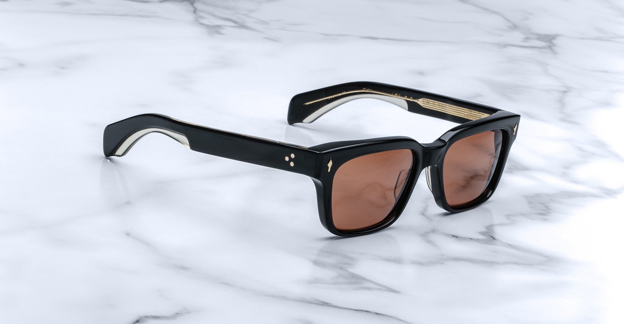 Jacques Marie Mage Molino 55 black rectangular sunglasses with brown lenses, top view.