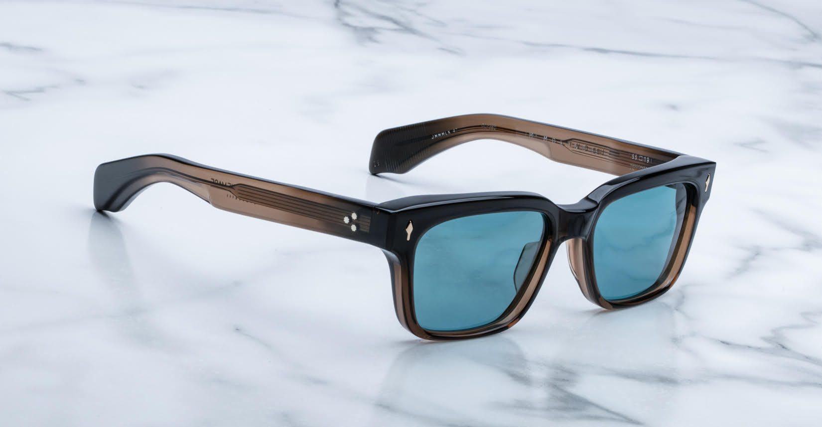 Jacques Marie Mage Molino 55 rectangular sunglasses with blue lenses and thick black-brown frames, front view.