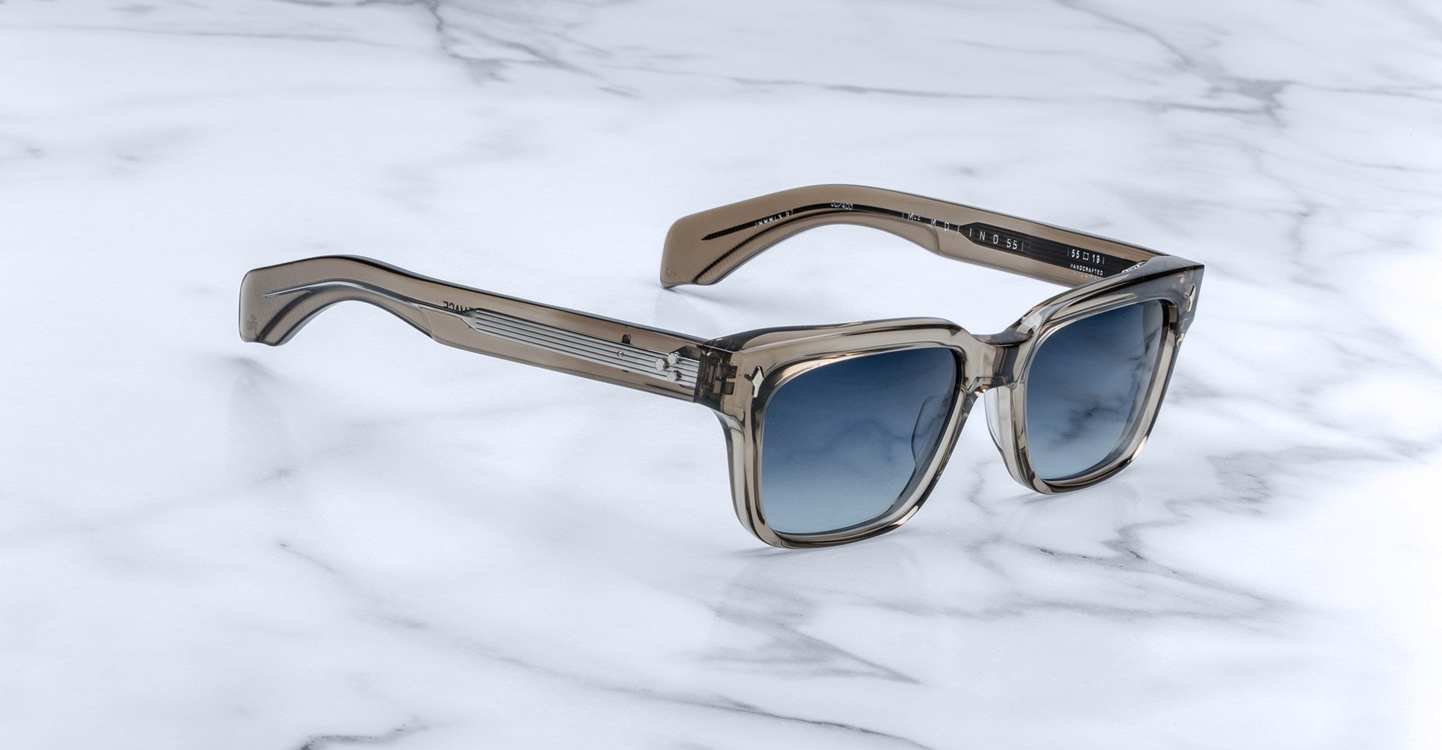 Jacques Marie Mage Molino 55 square sunglasses, front view, with UV grey gradient lenses and translucent brown acetate frame.