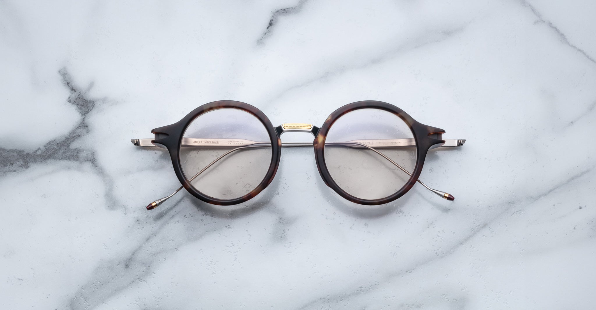 Jacques Marie Mage Norman eyeglasses with clear lenses, front view.