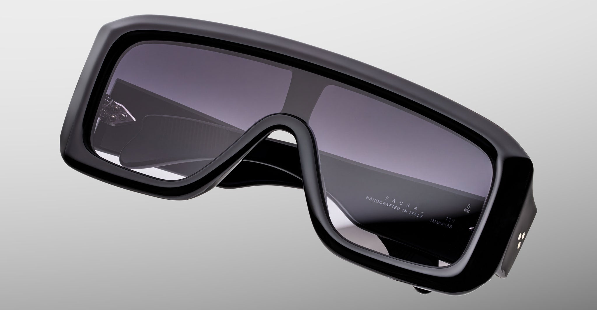 Jacques Marie Mage Pausa sunglasses, black oversized frame with dark lenses, front-facing view.