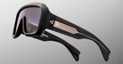 Jacques Marie Mage Pausa black sunglasses, thick frames, silver-accented arms, front and side view visible.