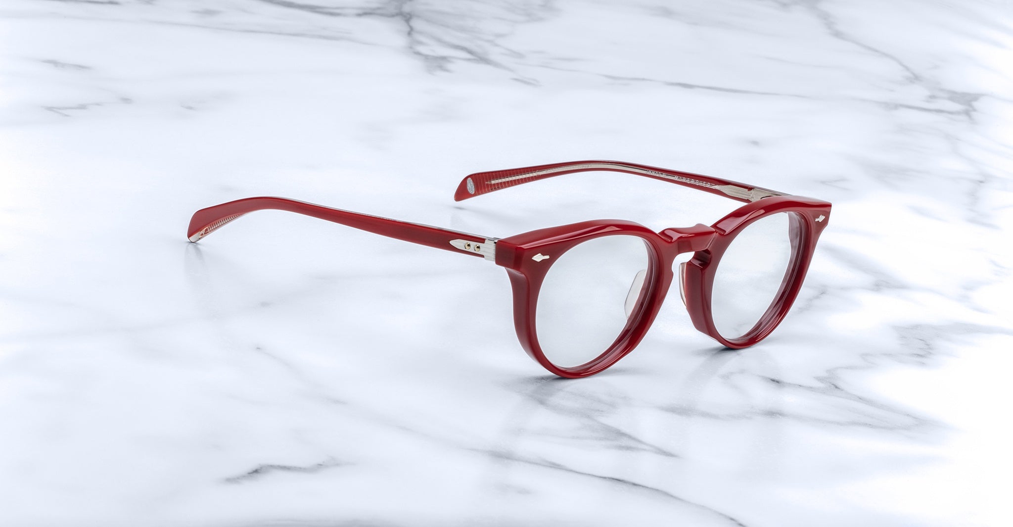 Jacques Marie Mage Percier round red eyeglasses with thick frames, front view.