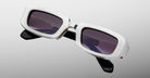 Jacques Marie Mage Ryder in Silver, rectangular silver-tone acetate sunglasses shown from a close angled front view, featuring thick sculpted rims, a low-profile bridge, and gradient tinted lenses.