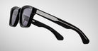 Jacques Marie Mage Sonata black rectangular sunglasses with thick frames and silver arm accents, shown from a front-facing angle.