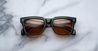 Jacques Marie Mage Torino in Borneo square green-framed sunglasses with brown lenses, front view.