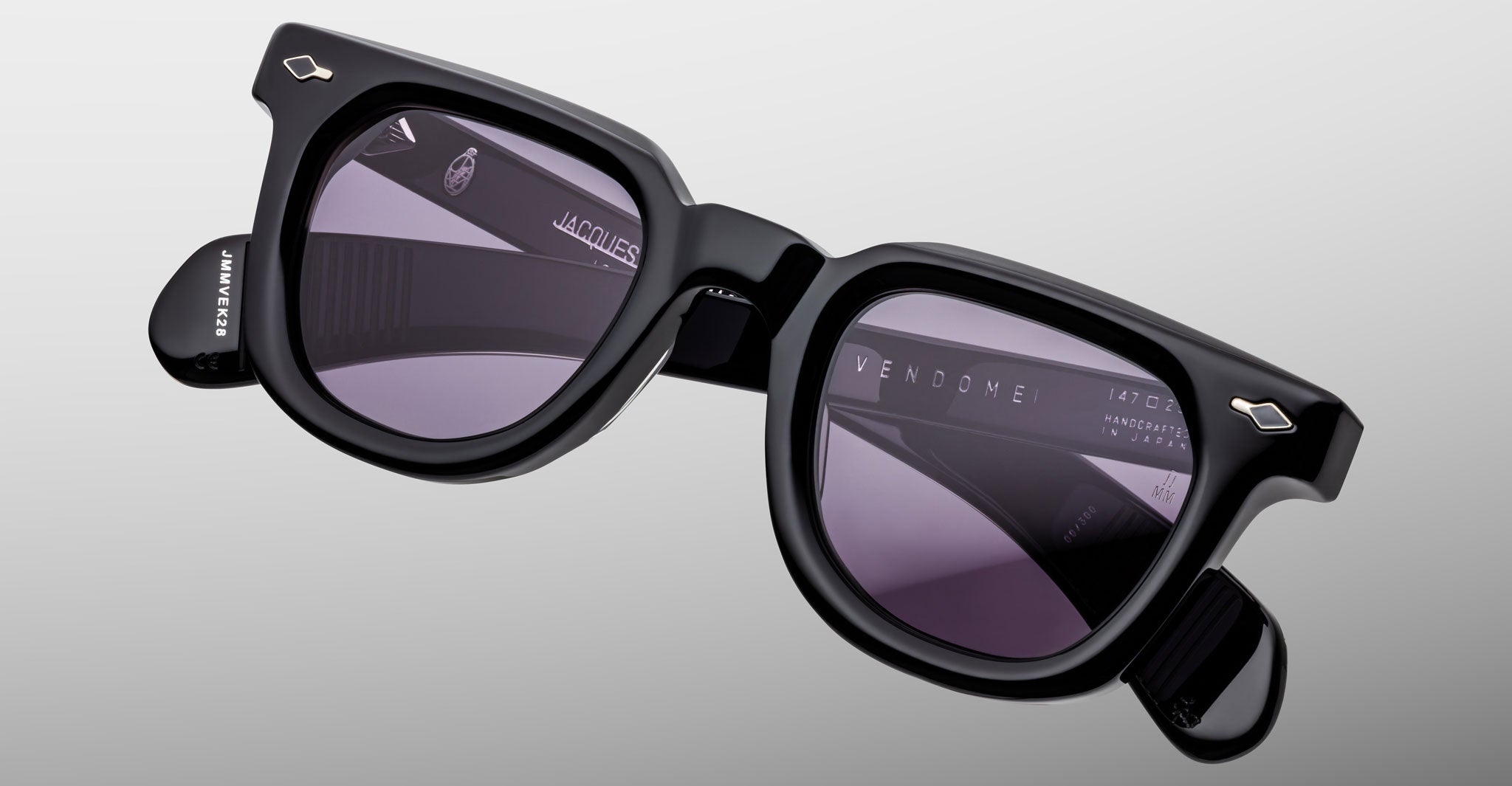 Brand Vendome black sunglasses with thick frames and UV-protective dark lenses, front view.