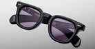 Brand Vendome black sunglasses with thick frames and UV-protective dark lenses, front view.