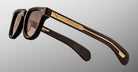 Jacques Marie Mage Vendome in Ganache brown sunglasses with gold detailing on the arms, profile view.
