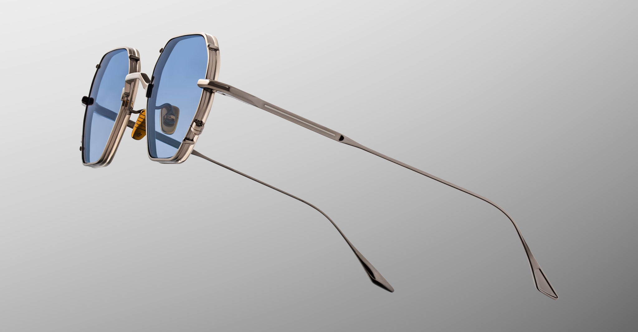 Jacques Marie Mage Verlaine aviator sunglasses, silver frame with blue lenses, shown from side angle.