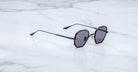 Jacques Marie Mage Verlaine sunglasses, black frame, polarized dark lenses, front view.