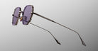 Jacques Marie Mage Verlaine sunglasses with angular frames, UV-protective purple lenses, and thin metal temples, front view.