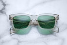 Jacques Marie Mage Walker sunglasses with green lenses, top view.