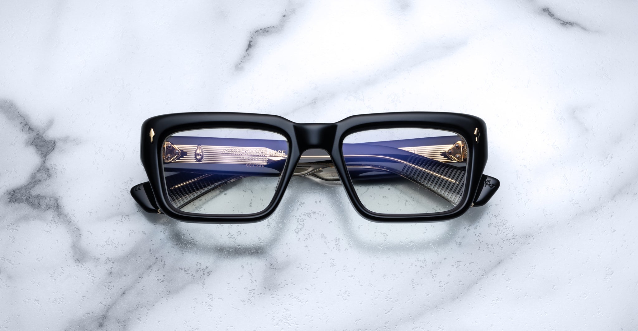 Jacques Marie Mage Walker eyeglasses with blue-reflective lenses, top view.