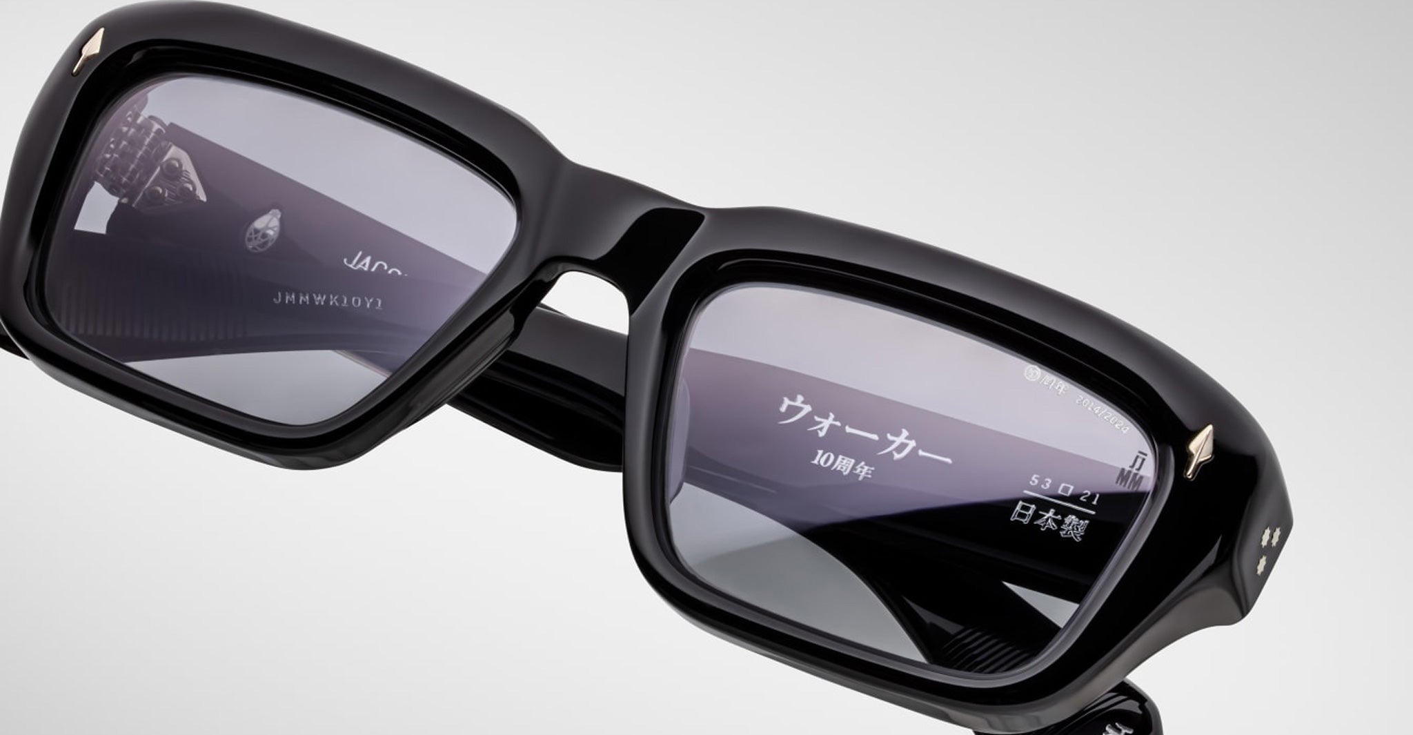 Jacques Marie Mage Walker smart eyeglasses display Japanese digital information on the right lens, front angle view shown.
