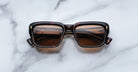 Jacques Marie Mage Walker rectangular tortoiseshell sunglasses with brown UV-protective lenses, top-down view.