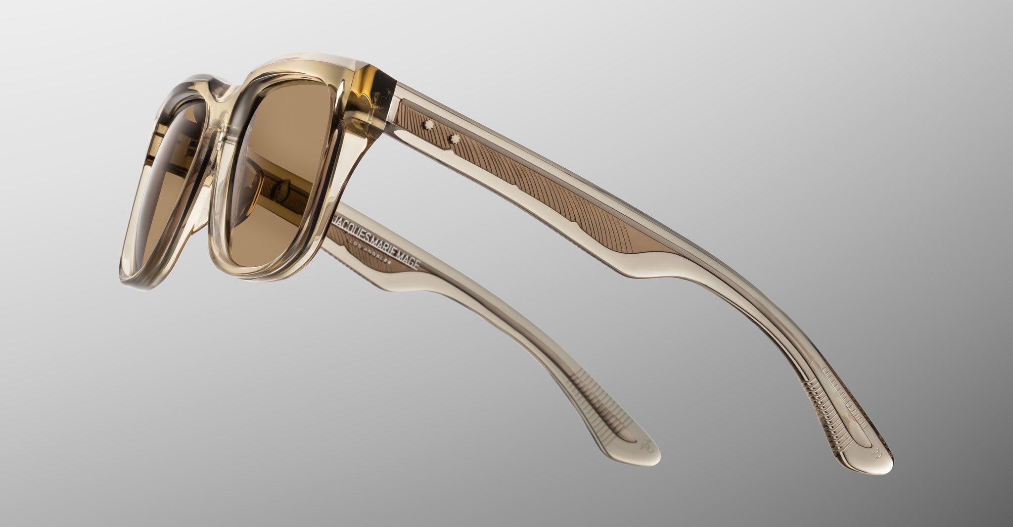 Jacques Marie Mage Wesley sunglasses, translucent beige frame with brown lenses, front-facing view.