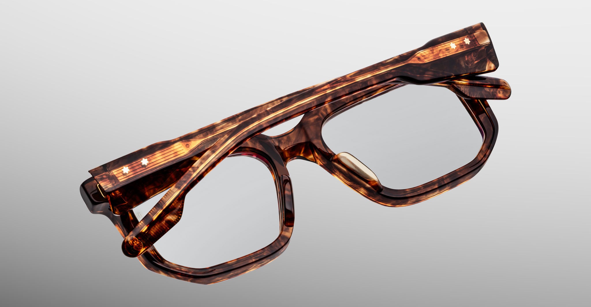 Jacques Marie Mage Yoshi in Argyle eyeglasses back view highlighting sculptural acetate and internal wirecore