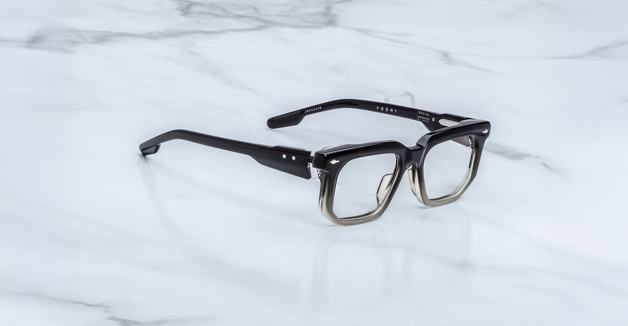 Jacques Marie Mage Yoshi in Black Fade optical frame featuring bold geometric lenses and wide sculpted temples