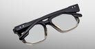 Jacques Marie Mage Yoshi in Black Fade optical frame featuring wide acetate temples and angular construction back view