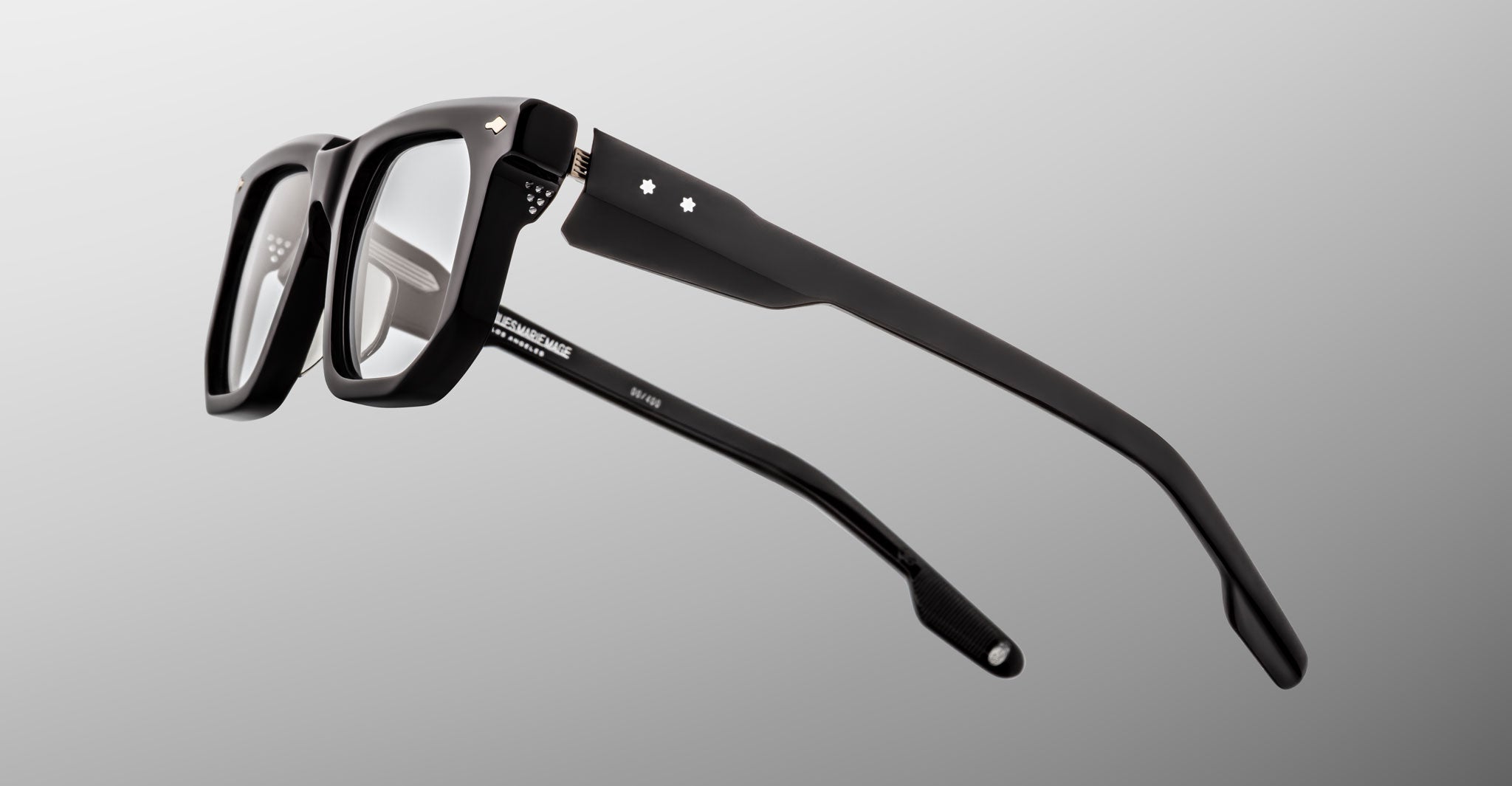 Jacques Marie Mage Yoshi in Black eyeglasses close-up showing temple structure and hardware detailing