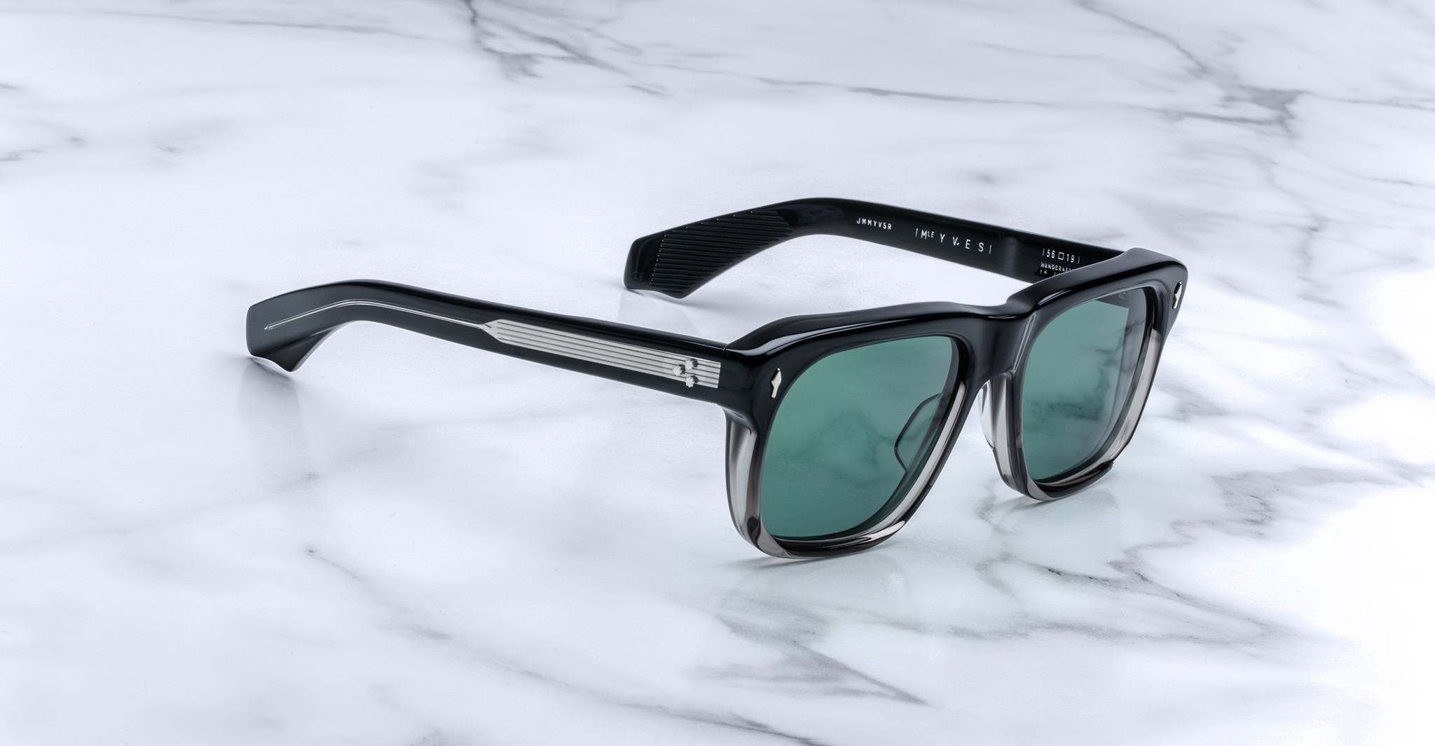Jacques Marie Mage Yves black rectangular sunglasses with green lenses, front view.
