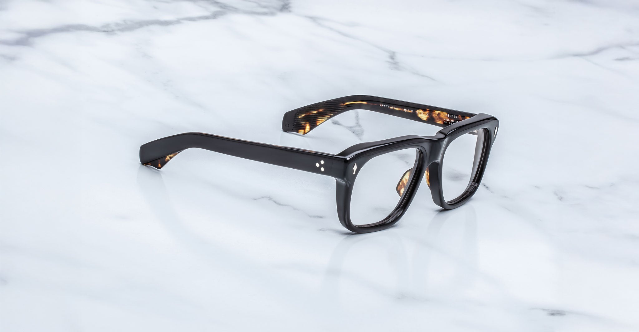 Jacques Marie Mage Yves black rectangular acetate eyeglasses, top view.