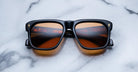 Jacques Marie Mage Yves sunglasses with amber lenses, top view showing front and lenses.