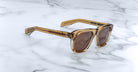 Jacques Marie Mage Yves brown square sunglasses with tinted lenses, front view, showing frame shape and color.