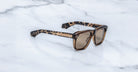 Jacques Marie Mage Yves square sunglasses in brown tortoiseshell with tan lenses, front view.