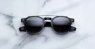 Jacques Marie Mage Zephirin 47 Clip On 2 black sunglass with dark lenses, top view.
