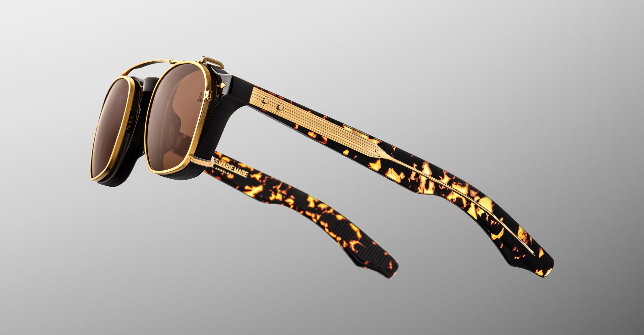 Jacques Marie Mage Zephirin 47 Clip On 2 round brown and gold sunglasses with tortoiseshell arms, front view.