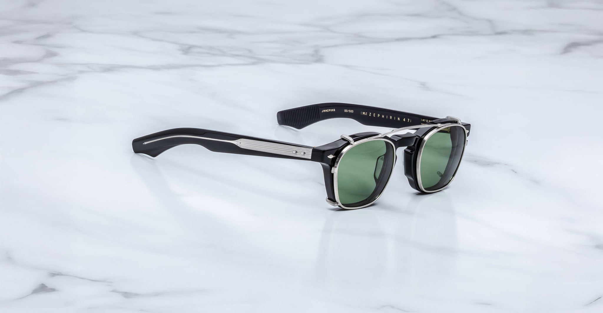 Jacques Marie Mage Zephirin 47 Clip On 2 sunglasses, green polarized lenses, silver accents, front angle view.