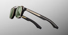 Jacques Marie Mage Zephirin 47 Clip On 2 sunglasses with green lenses and thick temples, front view.
