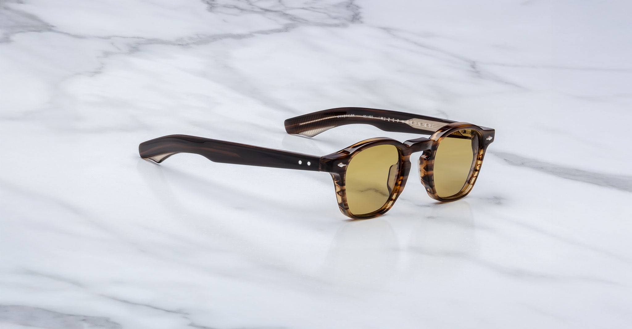 Jacques Marie Mage Zephirin 47 tortoiseshell sunglasses with yellow lenses, shown from above.