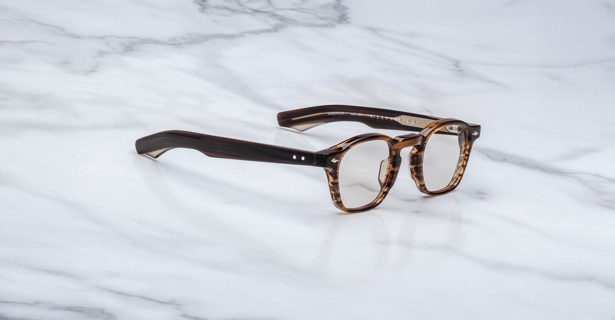 Jacques Marie Mage Zephirin 47 eyeglasses with thick tortoiseshell frames, top view.