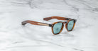 Jacques Marie Mage Zephirin 47 tortoiseshell sunglasses with blue lenses shown from above.